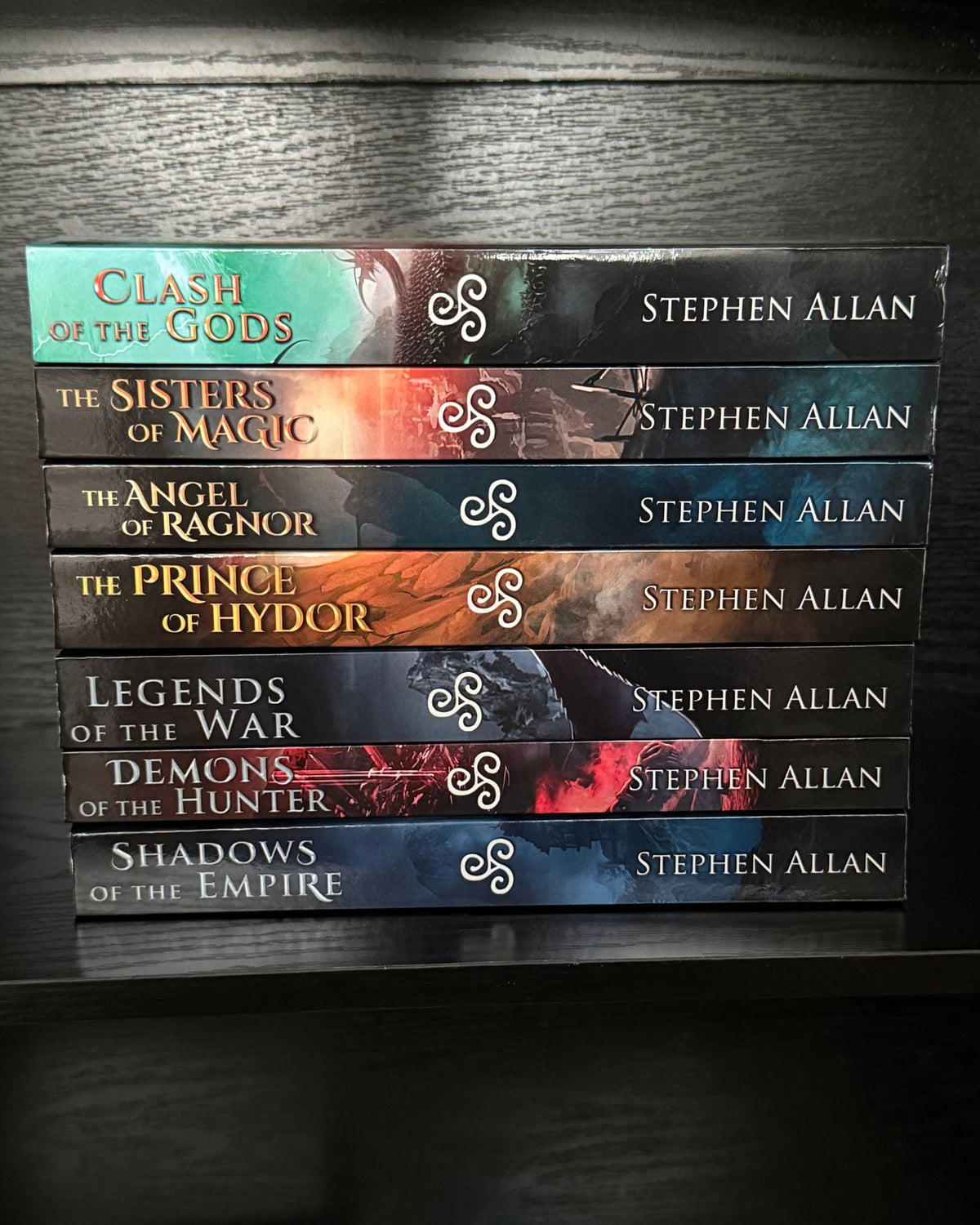 All seven War of the Magi paperbacks stacked with spines out, from Shadows of the Empire to Clash of the Gods